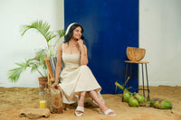 BEIGE SLEEVELESS FITTED DRESS